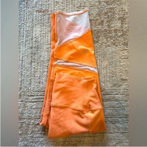 ALO Yoga Vibrant Orange and White Leggings